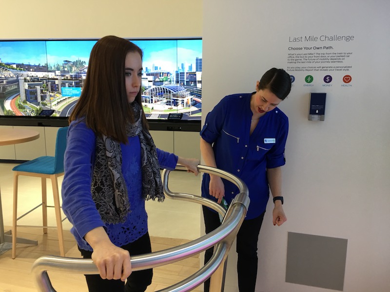 Victoria Schein of Ford demonstrating the transportation simulator at Ford HUB