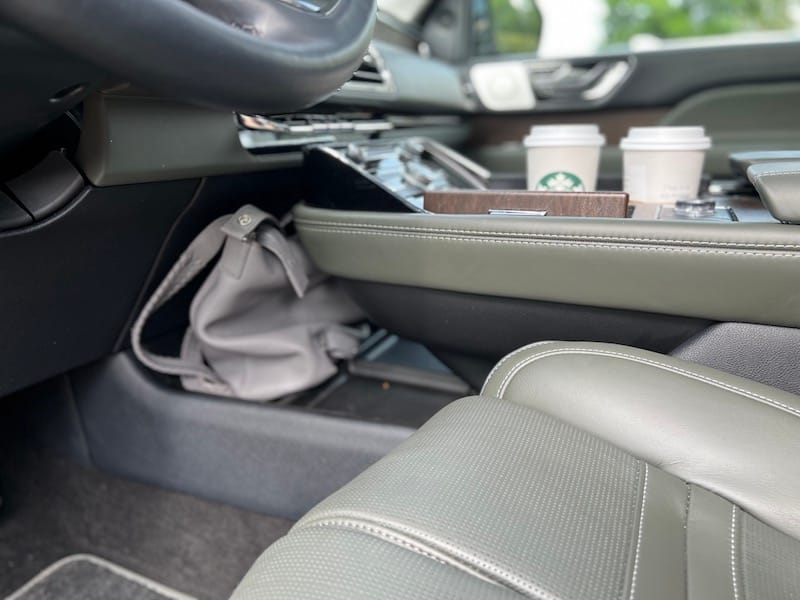 15 Great Places to Put Your Handbag, Tote Bag or Crossbody Bag in the Car 6 The Floating Center Console In The Navigator Creates A Great Place To Put Your Handbag