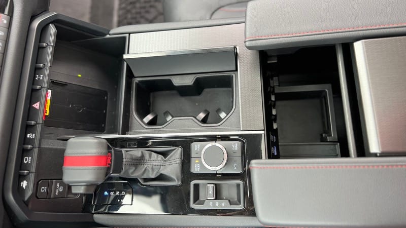 The Trd Pro Sequoia Offers A No Frills Center Console With A Wireless Charging Pad, Cupholders And Extra Storage Under The Arm Rests. Photo: Allison Bell