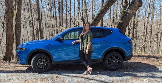 Electrification, The Dodge Way: Power, Performance and Fun in the 2023 Dodge Hornet Plug-in Hybrid SUV 13 The author and the Dodge Hornet in the woods.