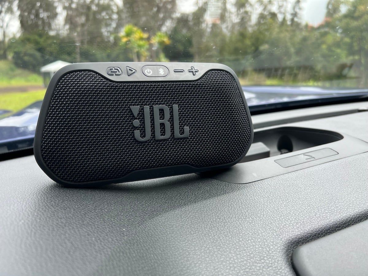 This JBL bluetooth speaker docks in the dash or can pop out for tunes that go with you