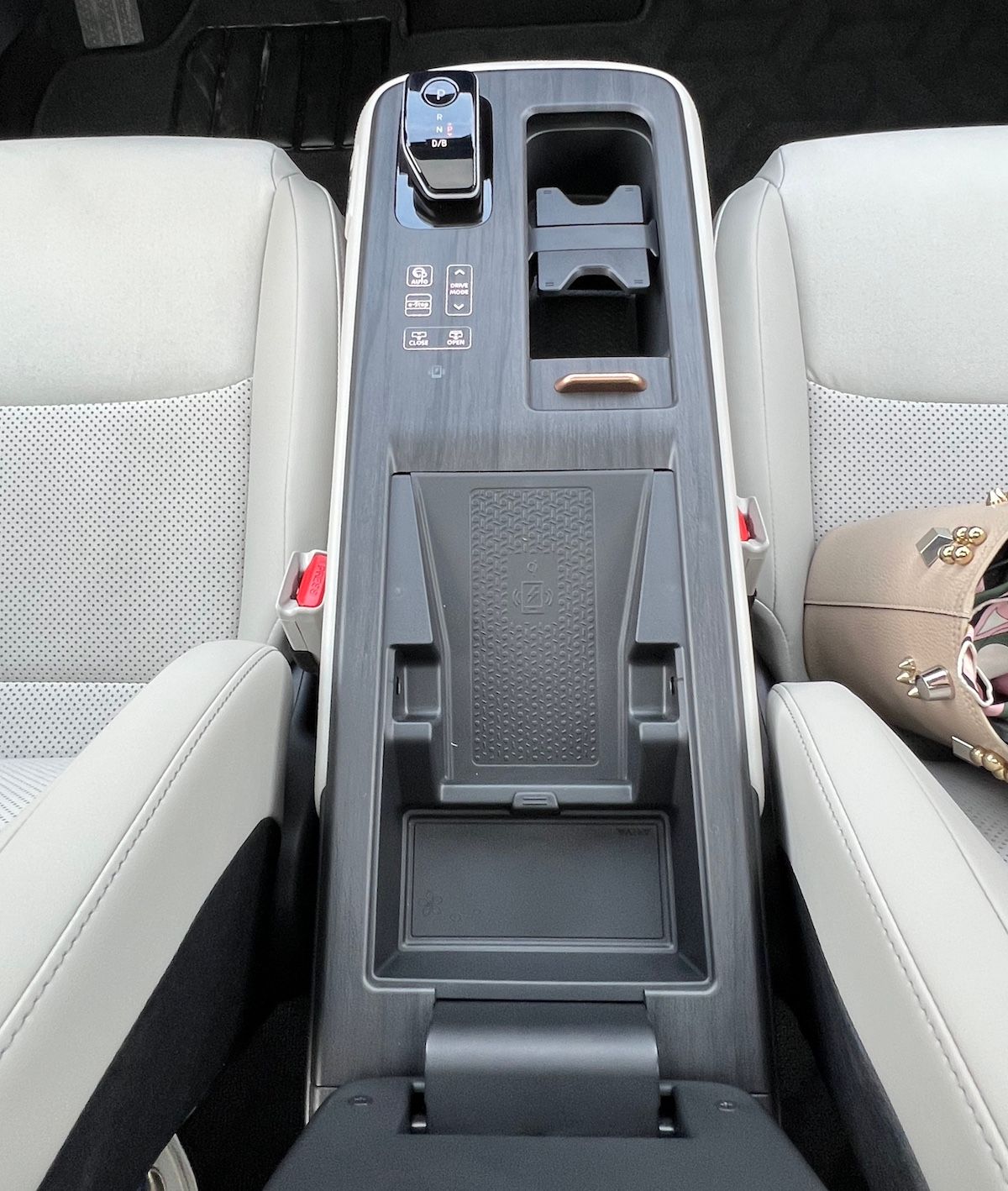 The Command Center Has A Small Cubby Under The Arm Rest As Well As A Phone Charge Pad