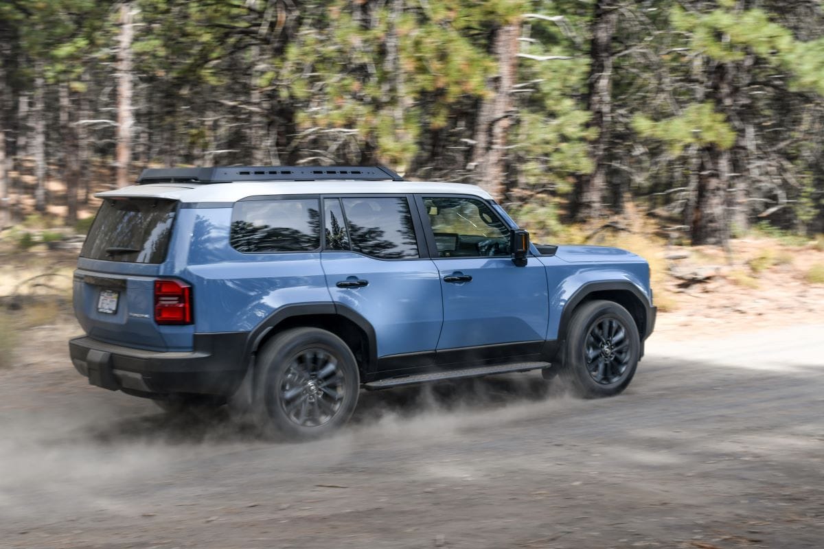 Love it or Leave it: The Highs and Lows of the 2024 Toyota Land Cruiser 3 A Rolling Shot Of The 2024 Toyota Land Cruiser Off-Road