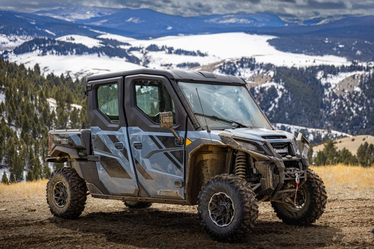The Kawasaki Ridge Crew Parked In Front Of A Mountain View