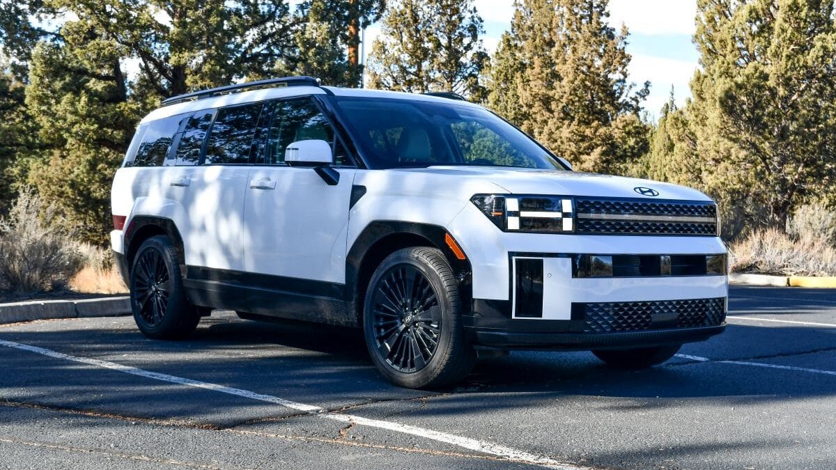 The Side Profile Of The 2024 Hyundai Santa Fe Calligraphy Hybrid Model From The Passenger'S Side Most Affordable 3 Row Suvs
