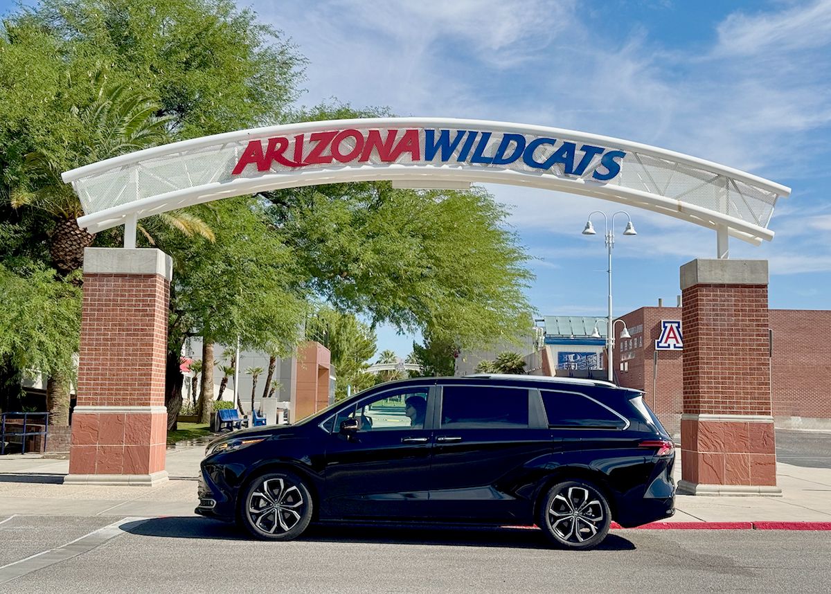 The 2025 Toyota Sienna Platinum Hybrid in front of the Arizona State University campus