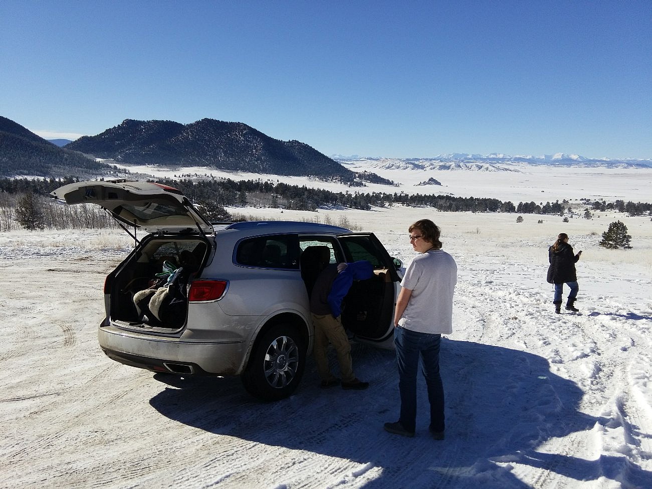 Kids and cold weather gear packed into the car for a day spent in the mountains.
