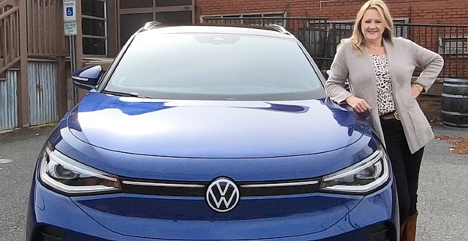 A Girls Guide to Cars | 13 of Our Absolute Favorites, the Best Electric Cars, Hybrids, and Plug-in Hybrid Electric Vehicles - Me with the VW ID.4