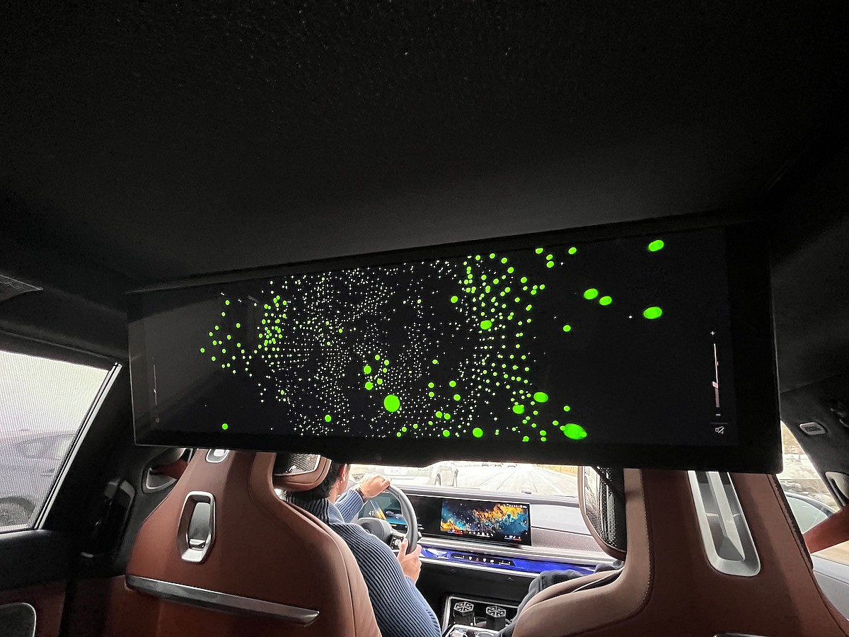 The theater screen in the BMW 7 Series adds to the sensory experience of Atmos