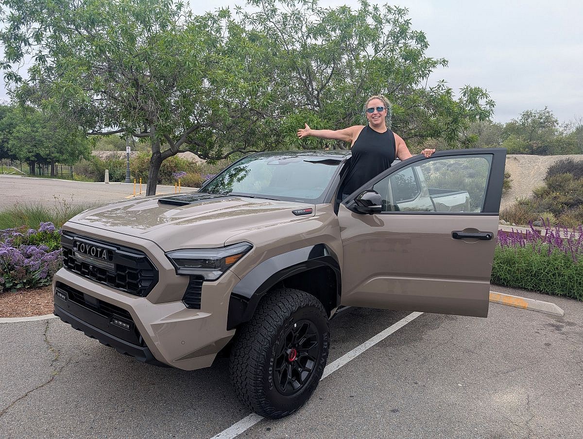 Liv standing with the 2025 Toyota Tacoma Trailhunter Double Cab