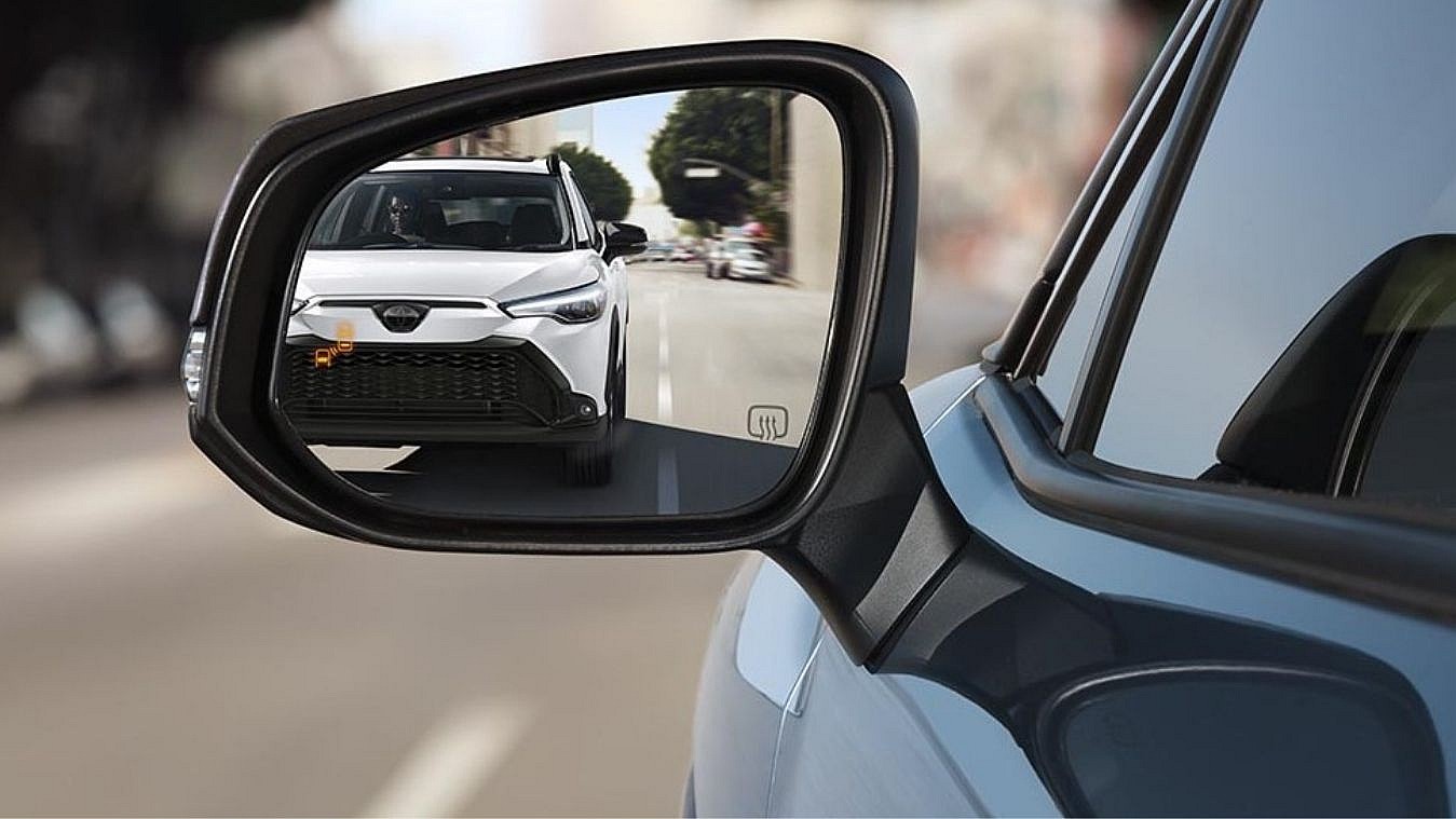 Toyota's New Feature Makes It Easier for Domestic Violence Survivors Across the Nation to Take Back Control 7 A car following behind another car, indicating someone may be stalking or following the lead car with bad intentions