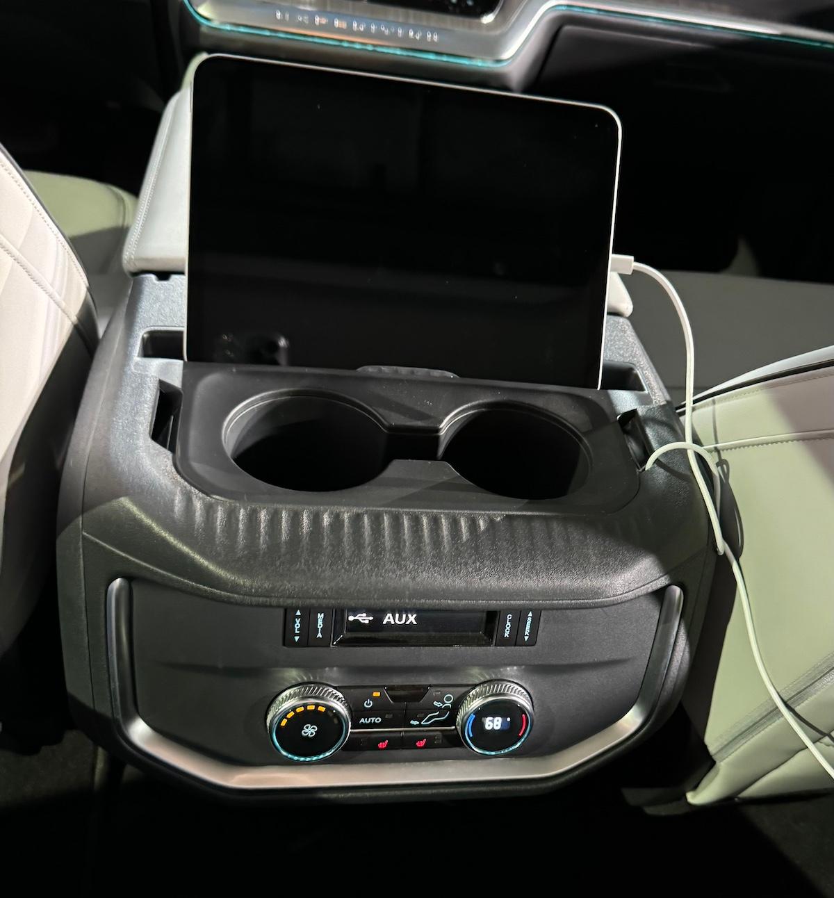 The Center Console Has A Tablet Holder For Rear Seat Passengers