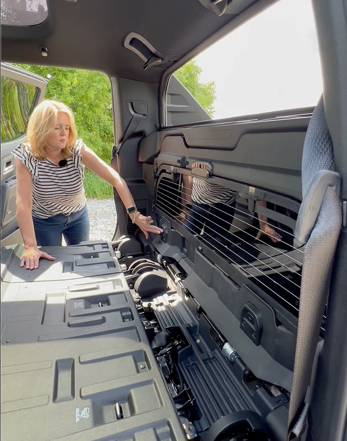 This is the Craziest Pickup Truck Feature - And We LOVE It: Chevrolet Silverado EV Midgate 7 Press The Midgate Release Button Chevrolet Silverado Ev