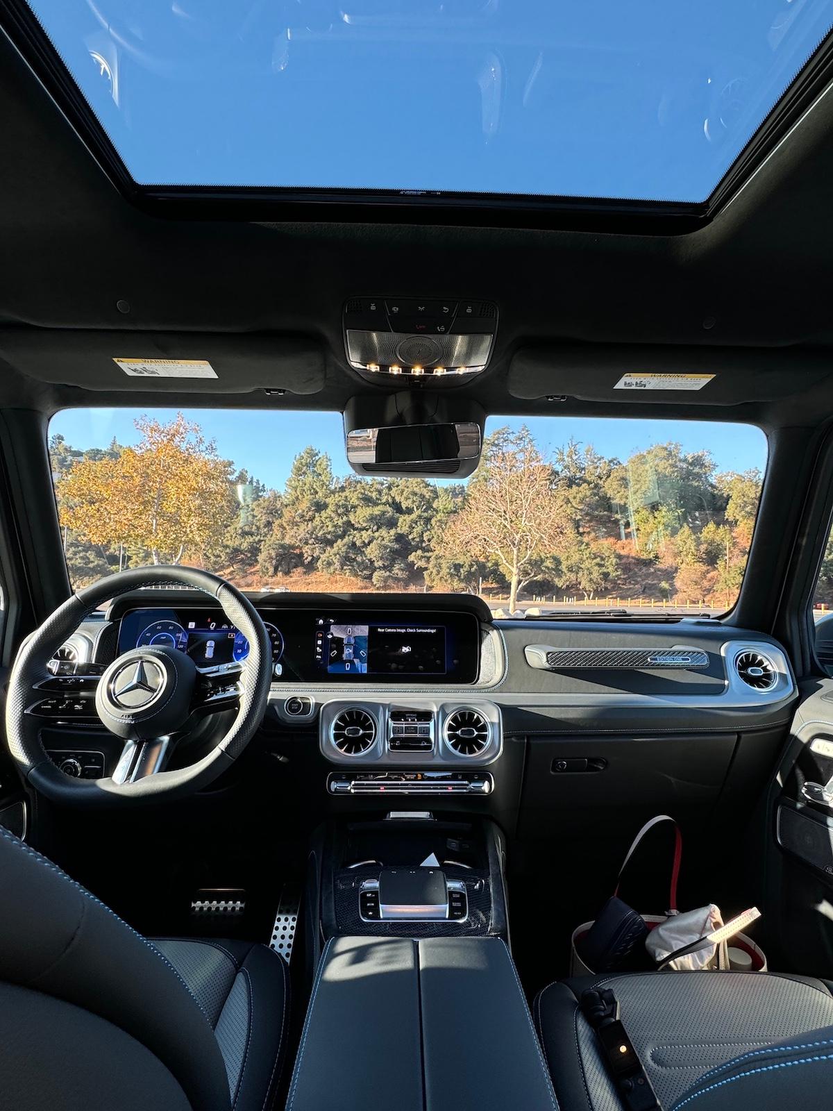 The 2025 Mercedes-Benz G 580 Modernizes the G-Wagen: Electric Powered, Still Rugged 10 The Front Seat And Sunroof In The 2025 Mercedes-Benz G 580 G-Wagen