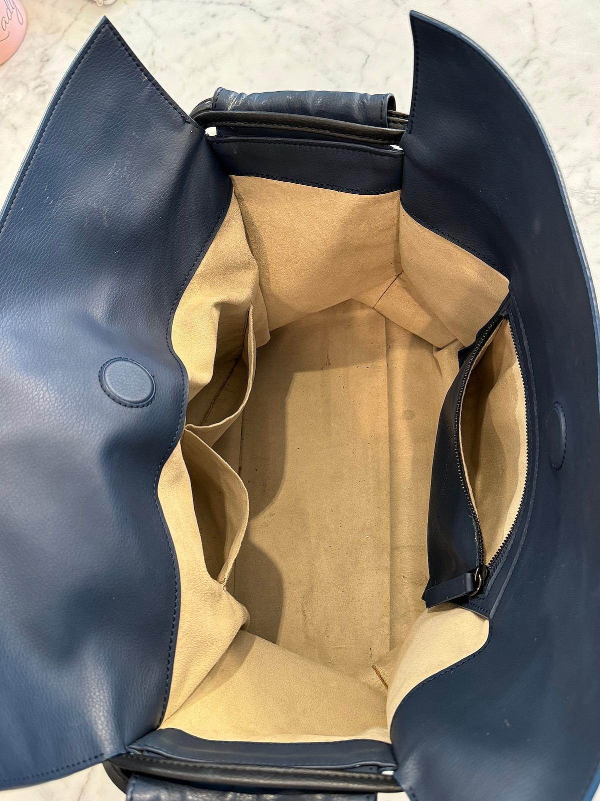 The Interior Of The Von Holzhausen Leatherette Bag Is Lined In Microsuede