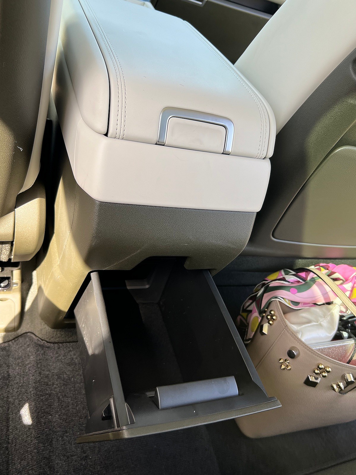 2024 Hyundai Santa Fe First Drive: The Best Things Come in Large, Classically Shaped Boxes 12 There'S A Drawer Under The Center Console For Rear Passenger Storage