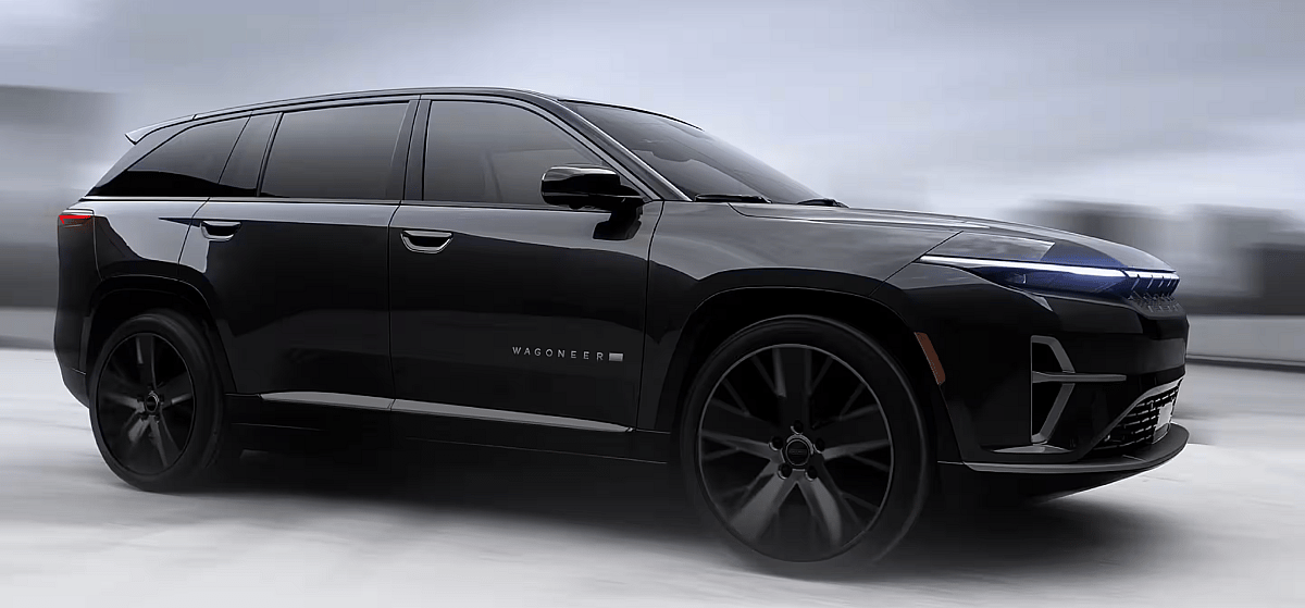 A Black Wagoneer S Driving