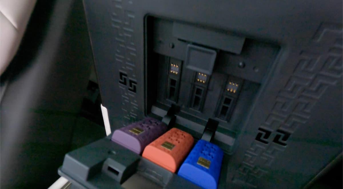 The Fragrance Diffuser Under The Center Armrest