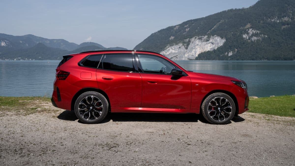 Go Home Chrome: Blacked Out Car Accents Deliver Chic, Stealth Luxury 10 The All New 2025 Bmw X3 M50 Parked Near A Scenic Lake