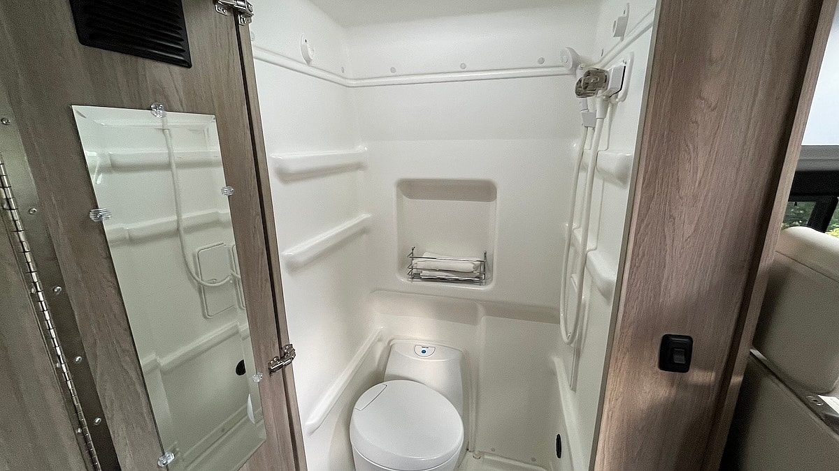 Is Van Life the Ultimate Escape? Exploring Life on the Road in a Winnebago Solis 5 Bathroom In Winnebago Solis Camper Van
