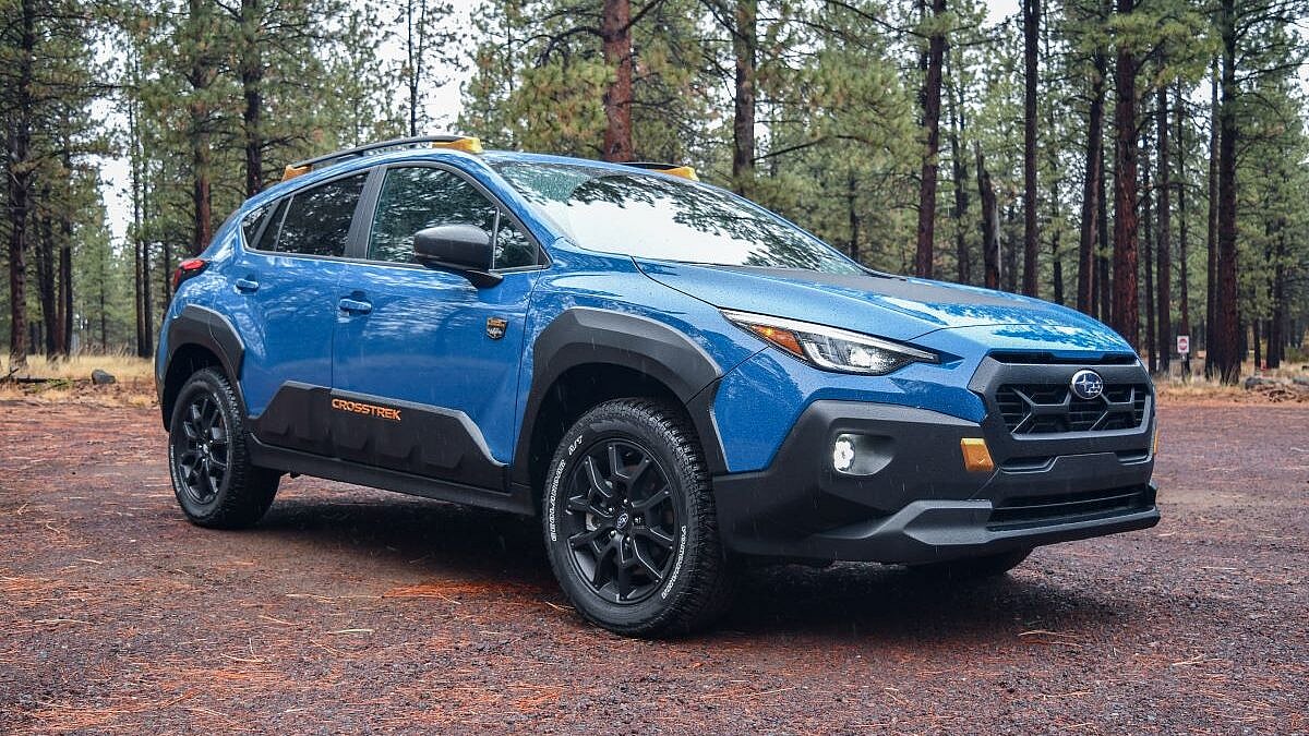 The 2024 Subaru Crosstrek Wilderness Parked On A Rainy, Dirt Road