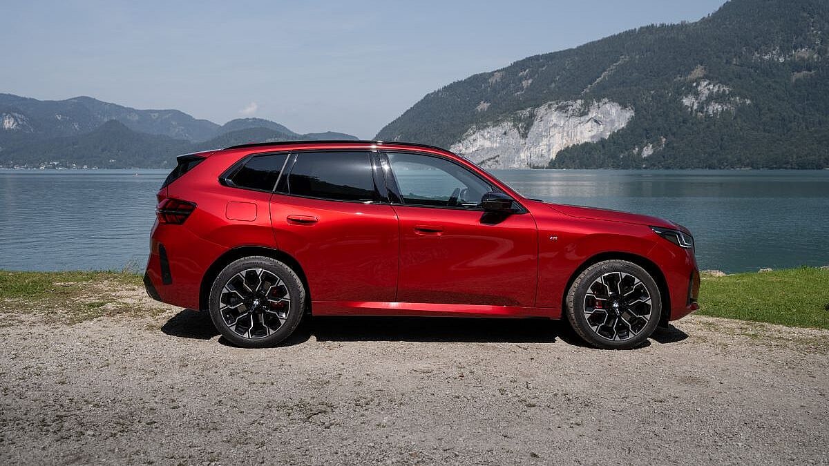 Go Home Chrome: Blacked Out Car Accents Deliver Chic, Stealth Luxury 11 The All New 2025 Bmw X3 M50 Parked Near A Scenic Lake