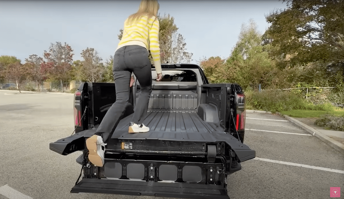 The Bed Step Makes It Easy To Get Into The 2025 Gmc Sierra Ev