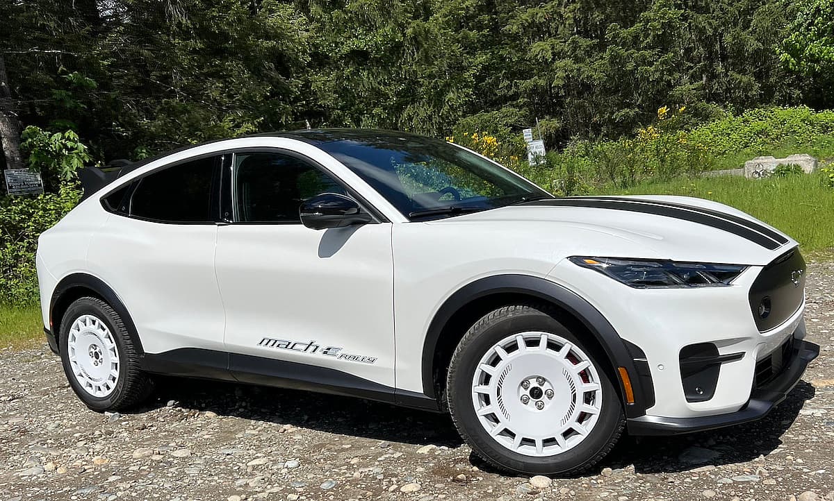 A Side View Of The White Ford Mustang Mach-E Rally Shows The Spoiler Isn