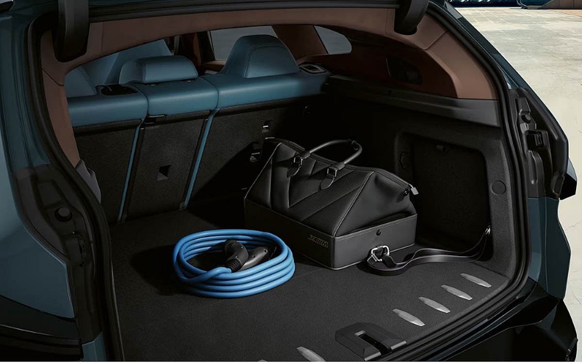2023 BMW XM: A Swanky Batcave of a Car, er, Plug-in Electric Hybrid SUV 12 The Xm Comes With A Stylish Handbag To Carry Your Charging Cable In The Cargo Area. Photo By Bmw Usa