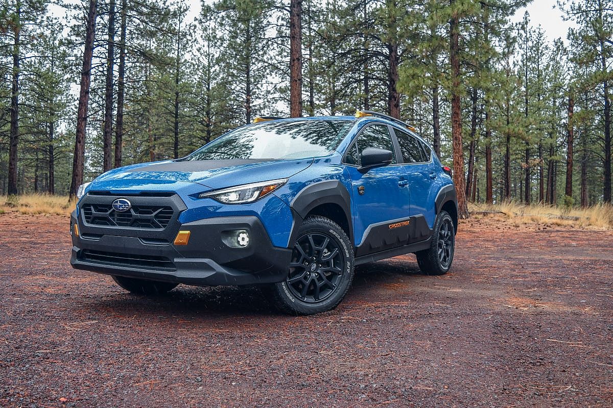 The 2024 Subaru Crosstrek Wilderness Posed For A Picture On A Rainy Dirt Road