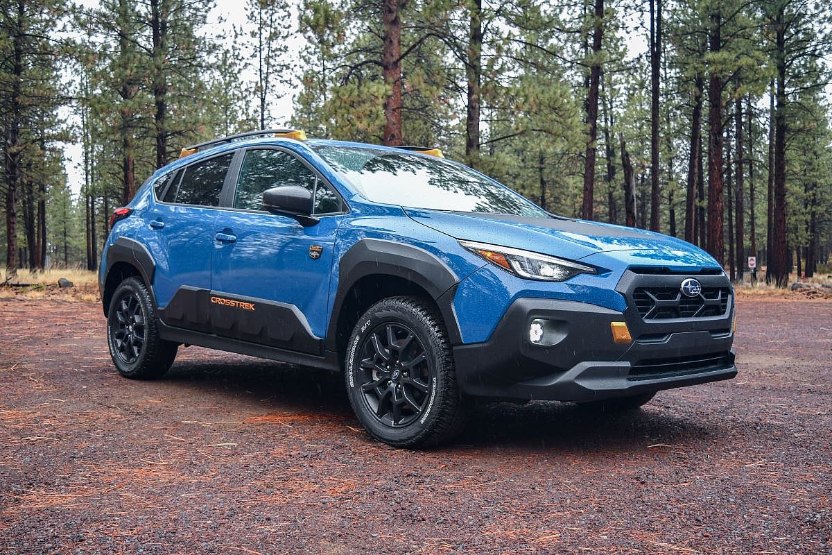 The 2024 Subaru Crosstrek Wilderness Parked On A Rainy, Dirt Road