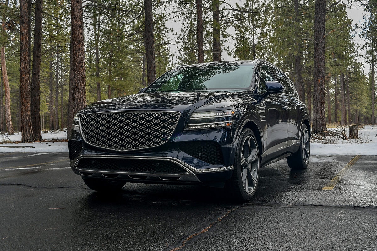 The Outside Of The 2025 Genesis Gv80 In A Wooded Parking Lot