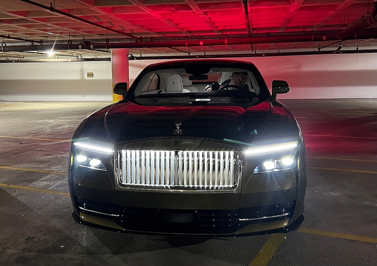 Sleek Headlights And The Illuminated Pantheon Grille In The Rolls-Royce Spectre