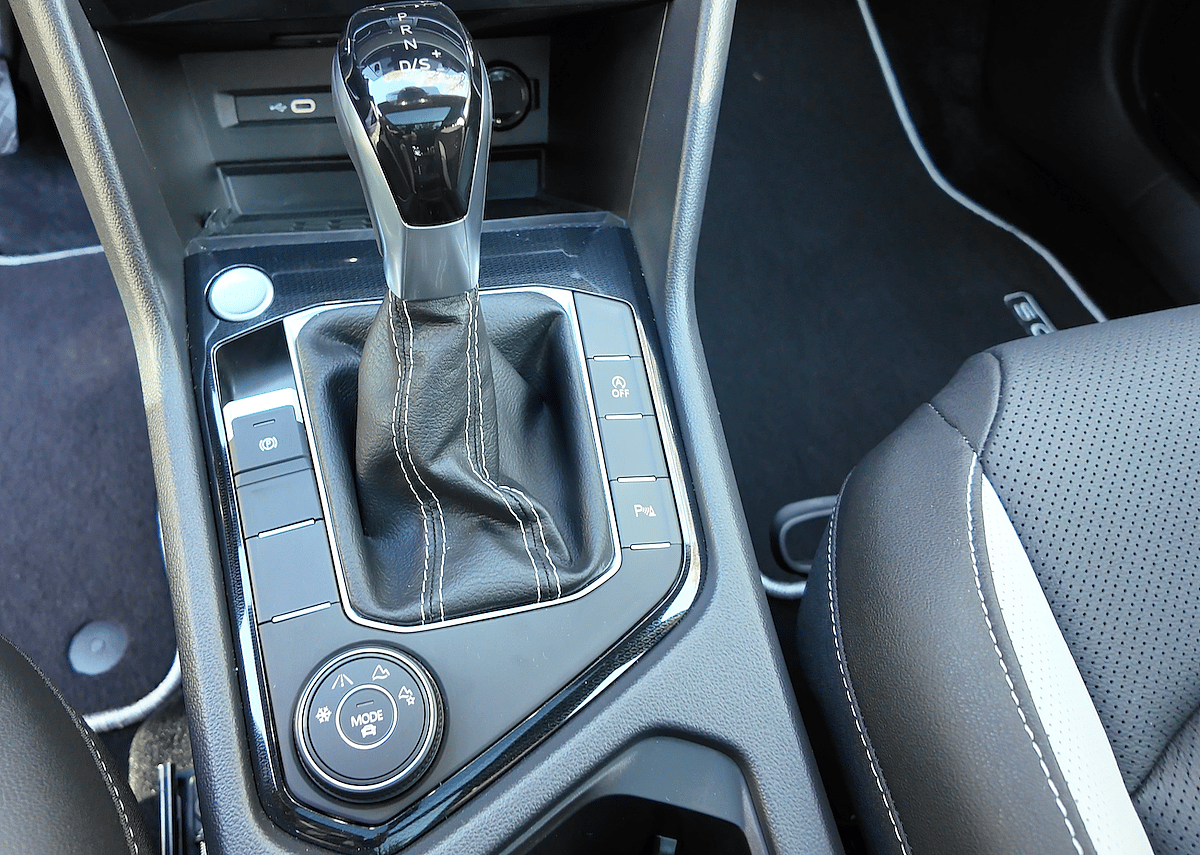 A Girls Guide To Cars | 2025 Vw Taos: Surprisingly Spacious And Tech-Forward—And Not Surprisingly, Fun To Drive - 2025 Vw Taos Charging Drive Modes Shifter Interior In Bright Moss Green Sel Natalie Merola A Girls Guide To Cars