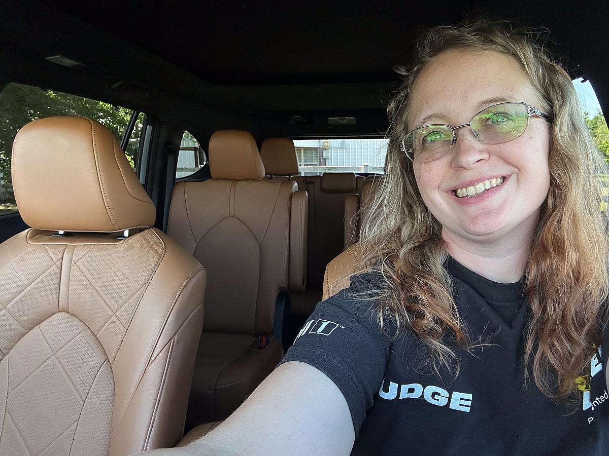 Erica Mueller Smiles In The Driver