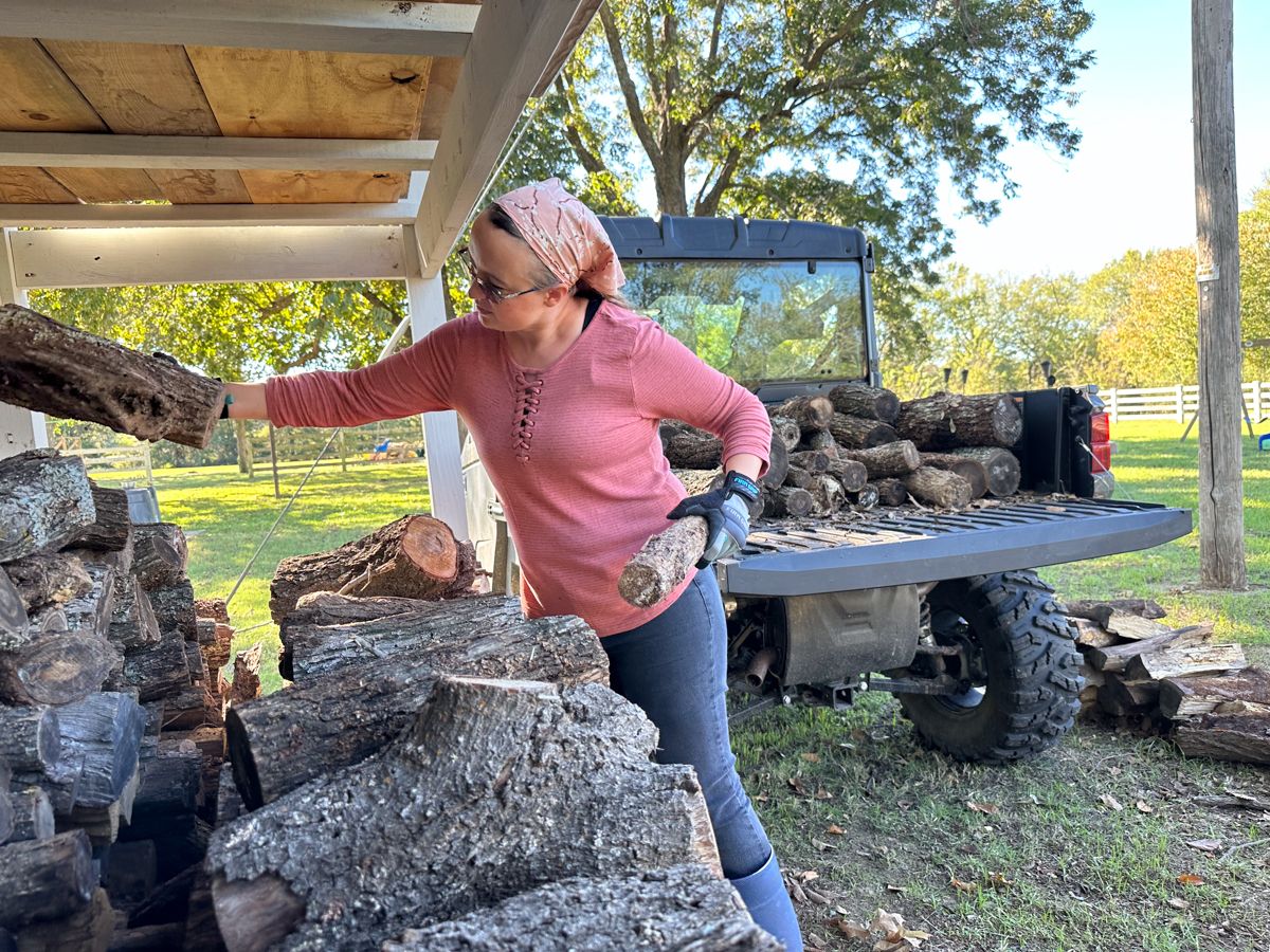 The Polaris RANGERXP 1000 Northstar Ultimate full of fire wood, making farm chores a synch