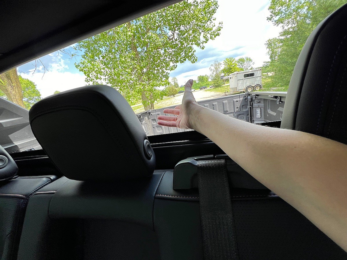 This is the Craziest Pickup Truck Feature - And We LOVE It: Chevrolet Silverado EV Midgate 11 The Rear Window Removes For That Wind In Your Hair Feeling Chevrolet Silverado Ev