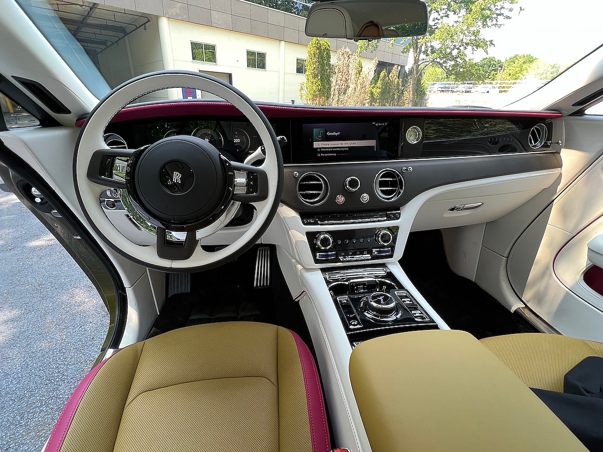 The Interior Of The Rolls-Royce Spectre; Notice The Door Opens From The Rear, Which Makes Retrieving The Umbrella Easy