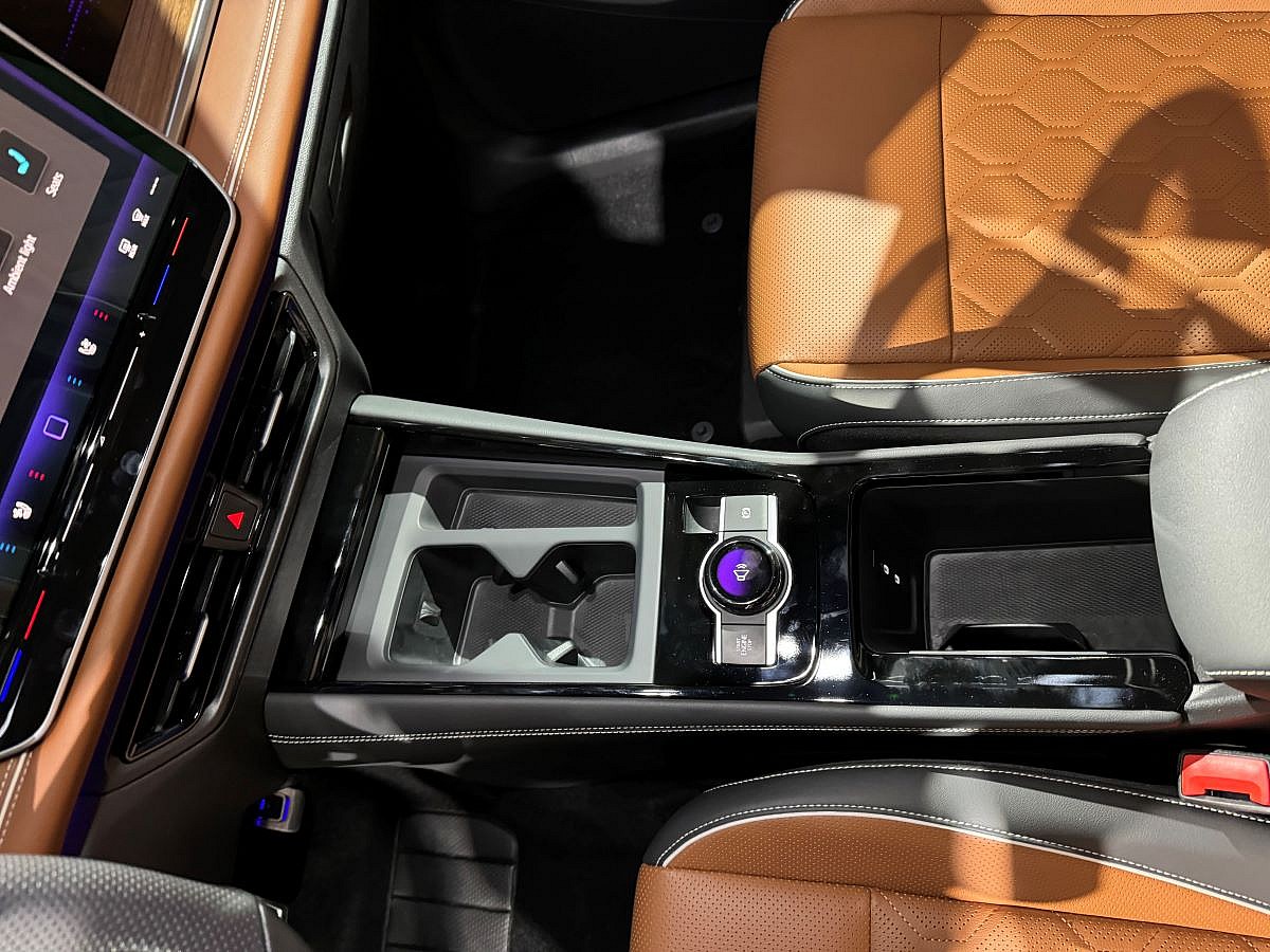 The Interior Of The 2025 Volkswagen Tiguan, Which Features A Volume Dial That Doubles As A Drive Mode Selector