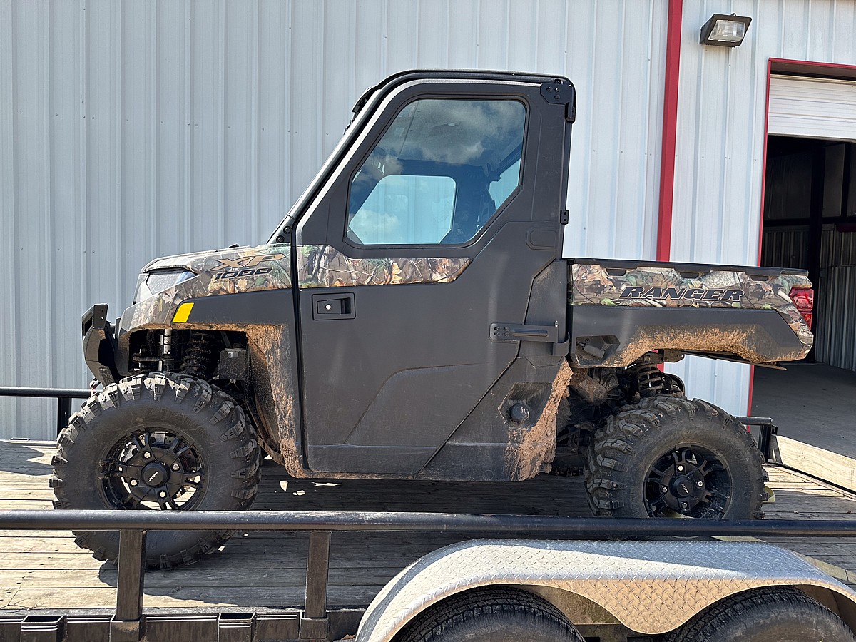 The Polaris Ranger Xp 1000 Northstar Ultimate On The Back Of A Trailer To Be Used On The Farm