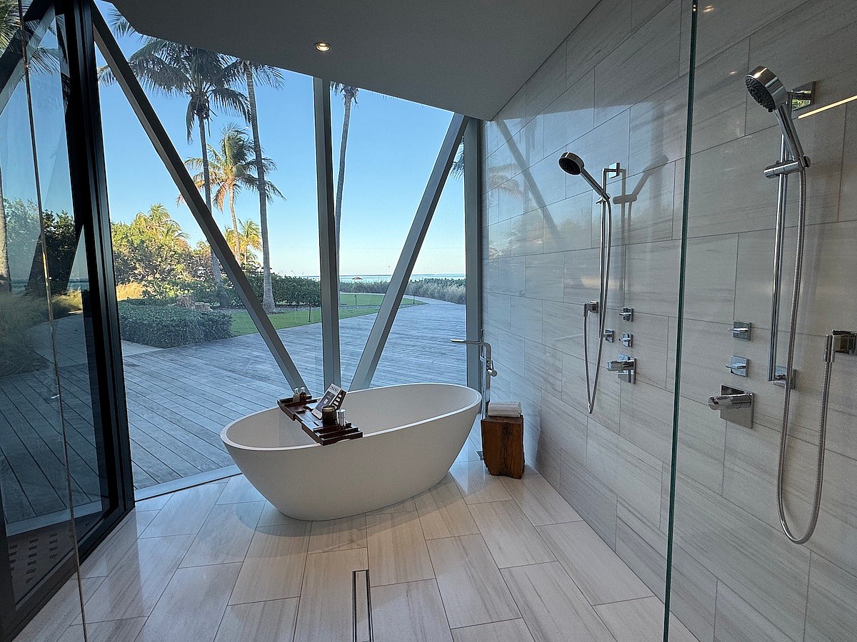 This Is The Indoor Shower And Soaking Tub In The Primary Suite