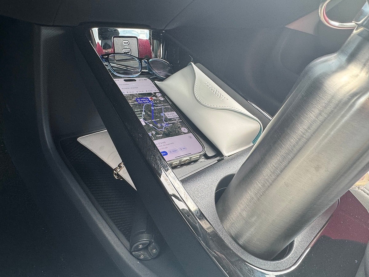 The Center Console Of The Ford Mustang Mach-E With All My Stuff