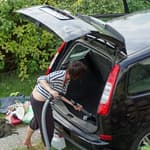 Woman Cleaning To Konmari Your Car
