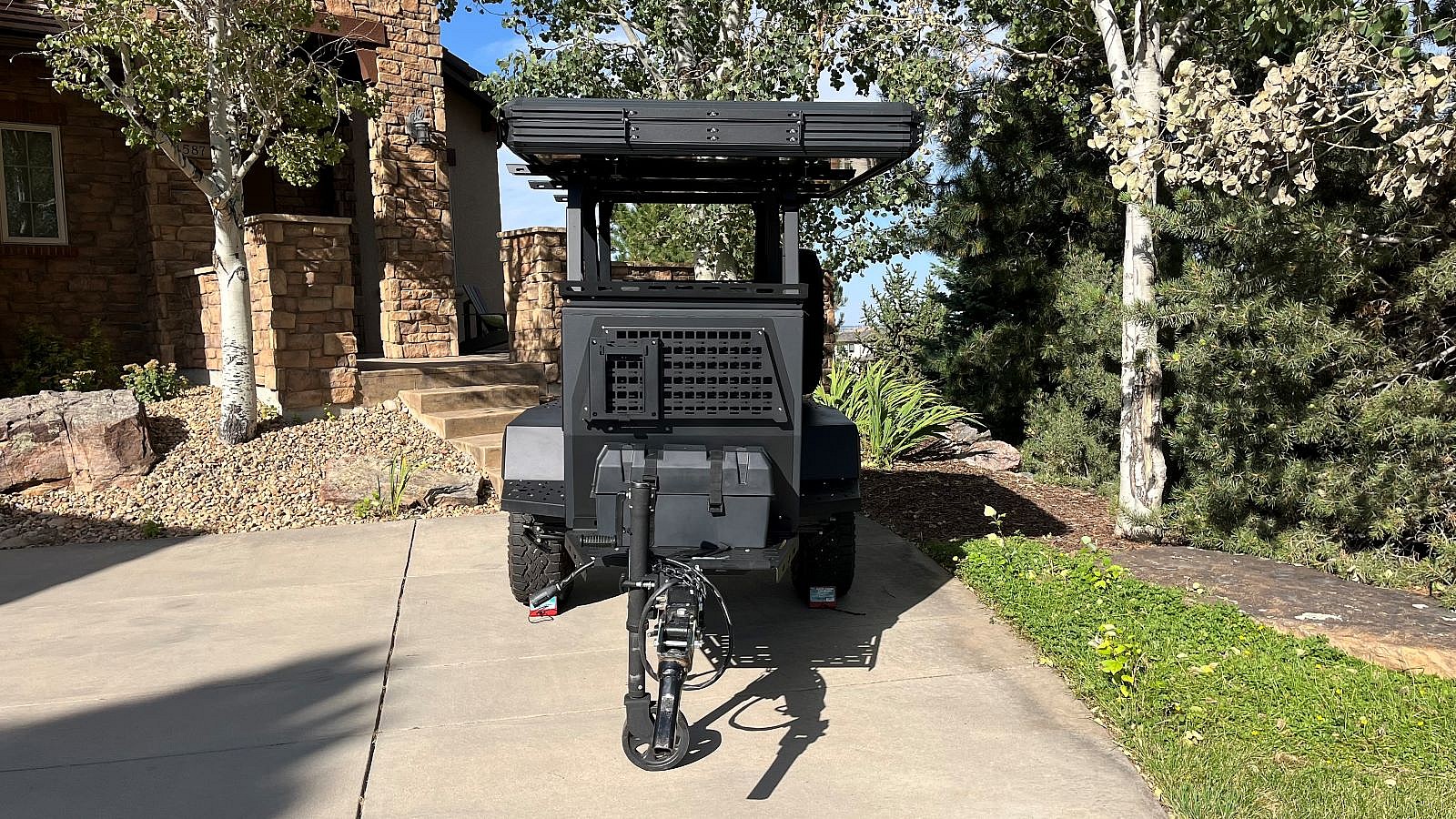 The Taxa Woolly Bear Parked In A Driveway, Showcasing The Small Footprint