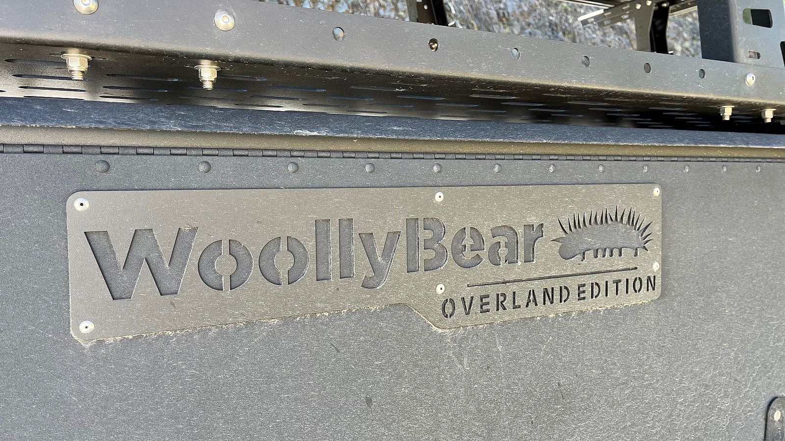 The Emblem On The Side Of The Taxa Woolly Bear Camping Trailer Overland Edition
