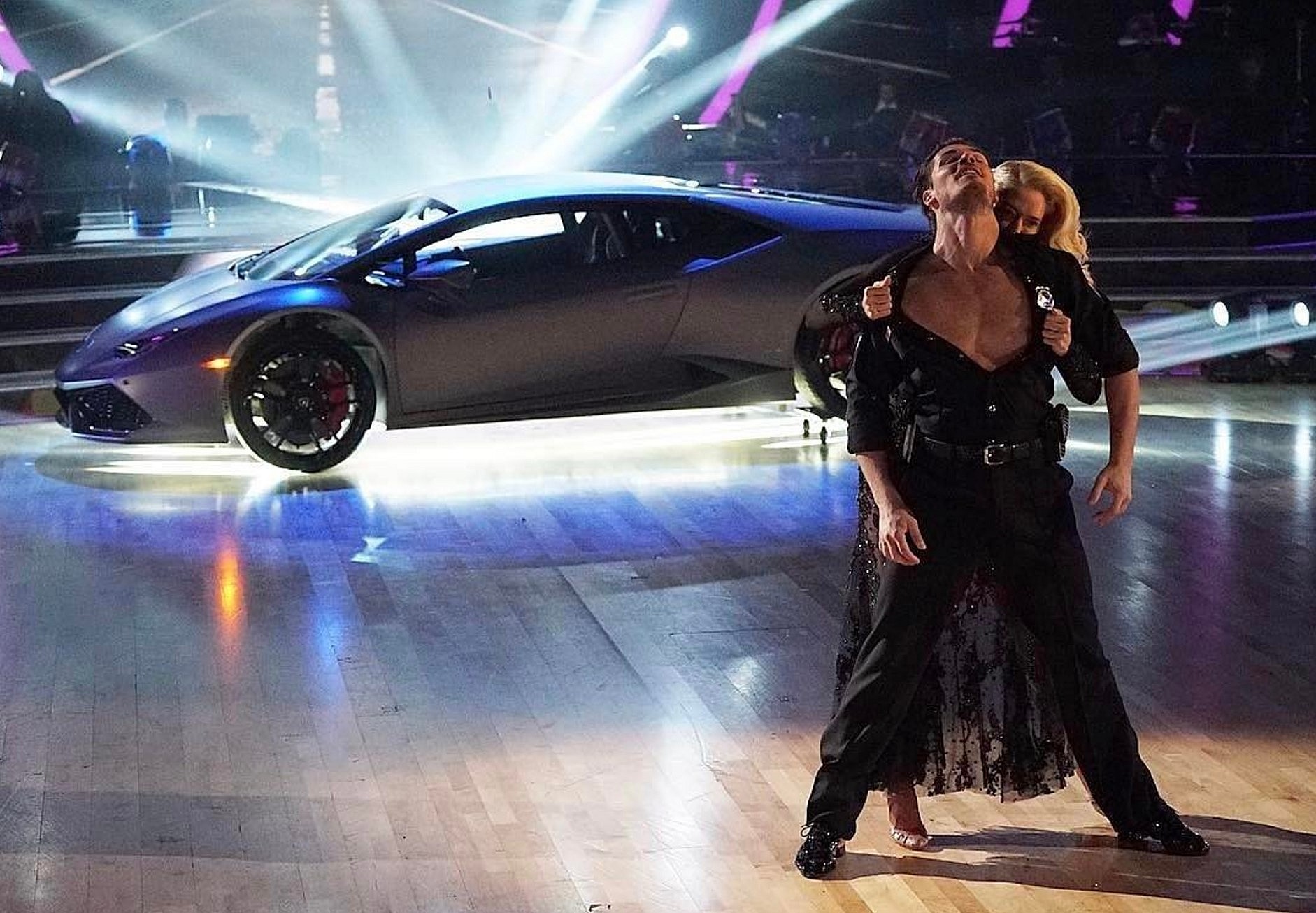 Erika Girardi Pictured With Her Lamborghini Huracan And A Muscular Man