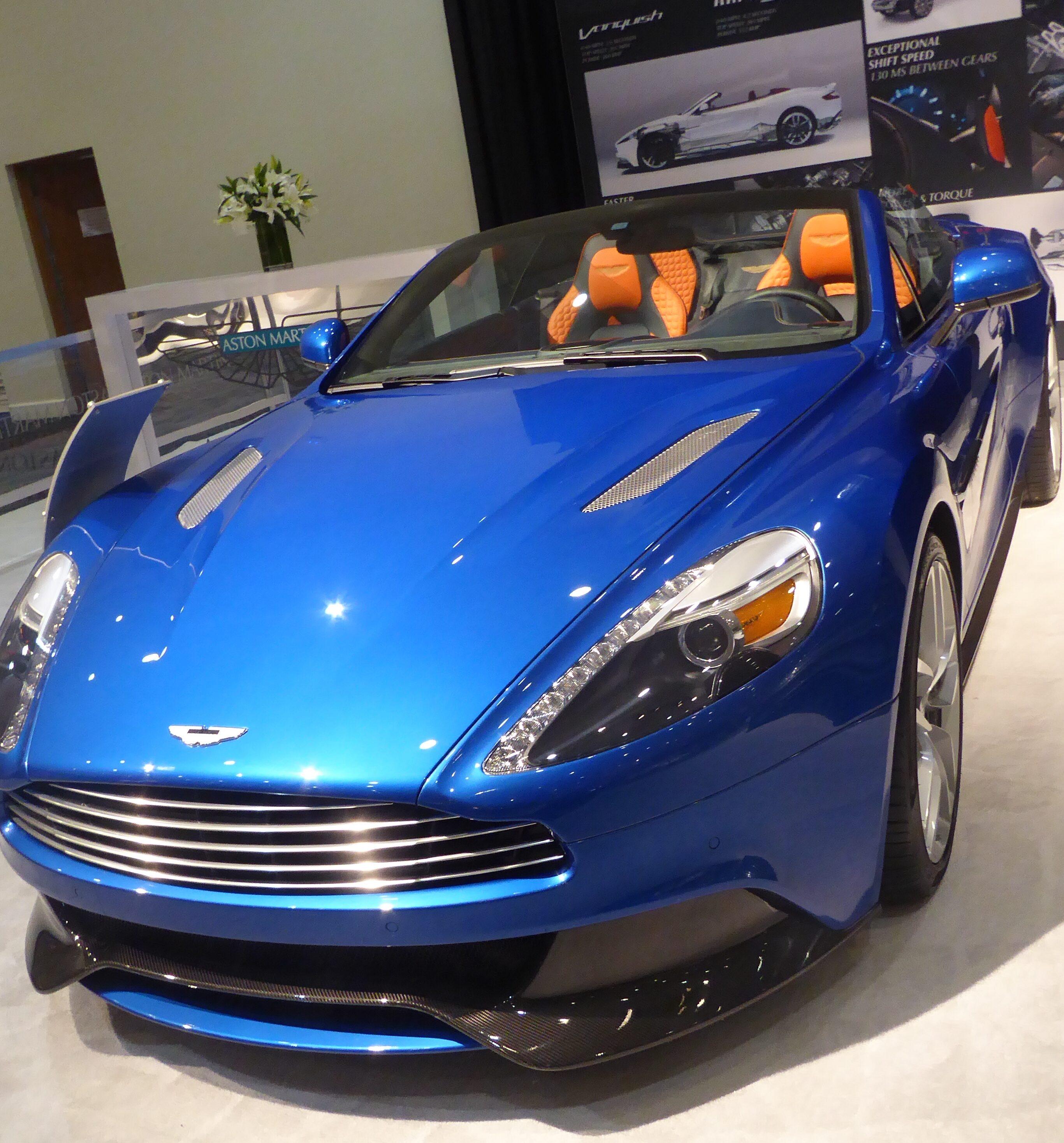 Taylor Swift and Travis Kelce's Getaway Cars—And Alternatives That'll Fit Any Budget 4 Aston Martin Vanquish