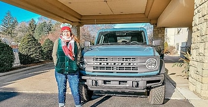 Woman Standing In Front Of Ford Bronco Black Diamond