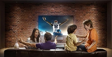 Excited Family Watching Tv