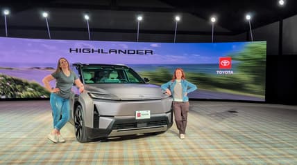 Shannon Bassett And Kristen Brown Standing Next To The 2027 Toyota Highlander Ev